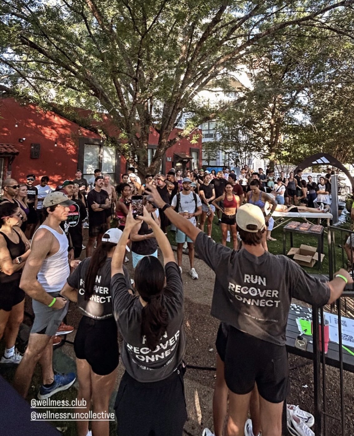 The Sweatcity community gathered outdoors at Casa de Luz